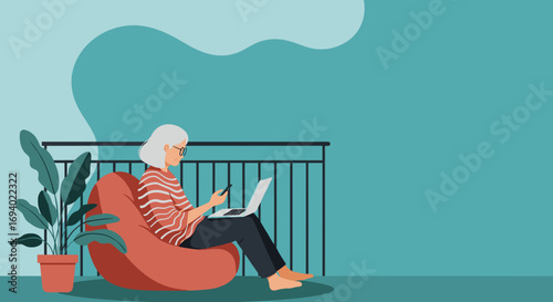 Senior woman using a laptop and smartphone while relaxing on a balcony, embracing modern technology and digital connection.