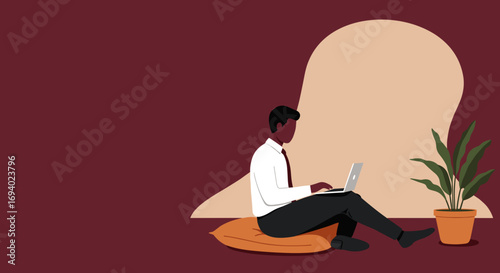 Professional Black man working remotely on laptop at home, sitting comfortably with a plant. Ideal for remote work, flexible lifestyle, or online business concepts.