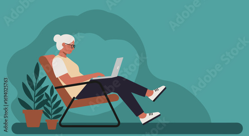 Relaxed senior woman confidently uses a laptop at home, embracing technology for remote work, online learning, or leisure. Modern aging and digital lifestyle.