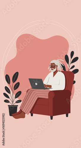 Senior man with dreadlocks comfortably using a laptop at home, reflecting modern remote work, education, or leisure for older adults. Focus on digital connection and relaxed lifestyle.