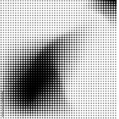 A monochrome abstract pattern composed of varying densities of black dots on a white background, creating a gradient effect from dark to light.