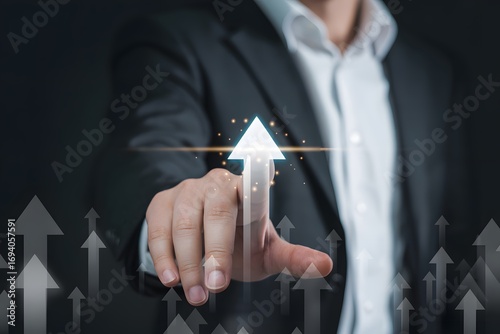 A hand touching an upward arrow, symbolizing growth and progress