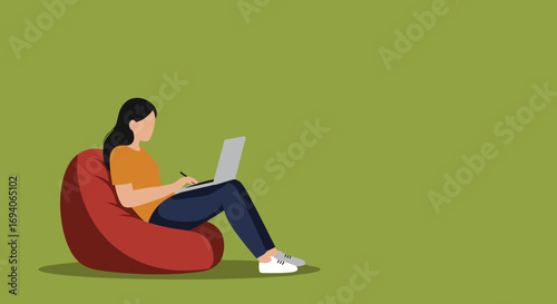 Person comfortably works on a laptop and writes notes on a bean bag. Ideal for concepts of remote work, freelancing, online learning, or creative productivity.