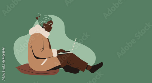 Elderly Black woman comfortably using a laptop, representing modern connectivity, remote work, or online learning for seniors. Ideal for technology, education, or lifestyle themes.