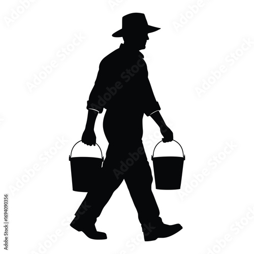 Silhouette of a farmer in a hat walking with two buckets of water in his hands