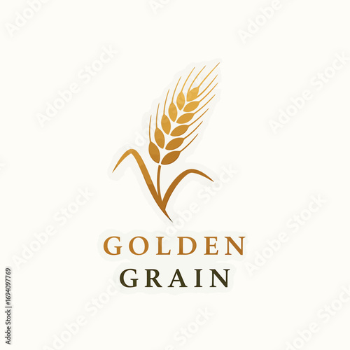 A stylized golden wheat stalk with the words "GOLDEN GRAIN" elegantly displayed below, representing agriculture and natural products.