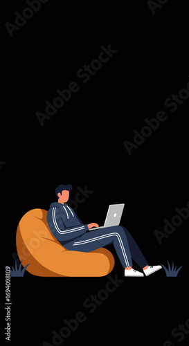 Young man in a tracksuit working on a laptop while relaxing on an outdoor bean bag chair. Ideal for remote work, casual business, or digital nomad concepts.