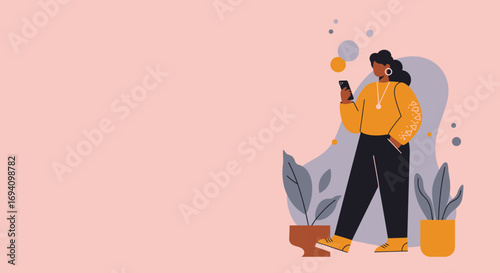 A young Black woman uses her smartphone while standing among potted plants against a light pink background, offering space for text or branding.