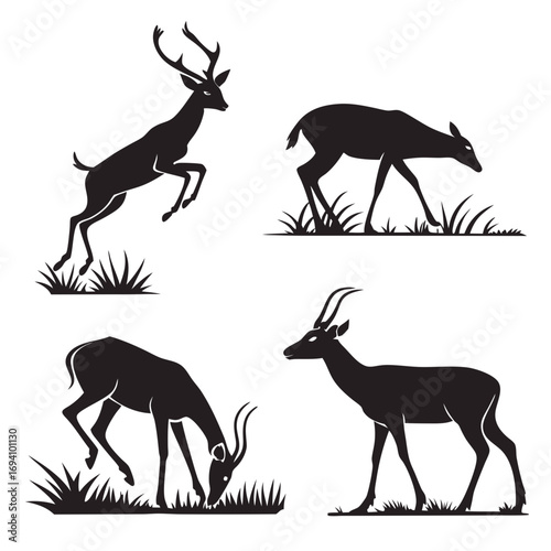 Four black deer and antelope silhouettes grazing and leaping