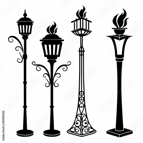 Four black torch lamps with flames light outdoor