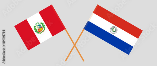 Crossed flags of Peru and Republic of Paraguay. Official colors. Correct proportion. Vector illustration