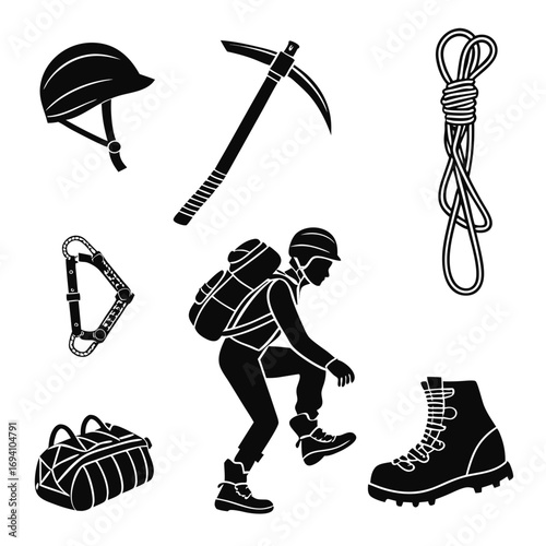 Mountaineering gear and climber silhouette climbing