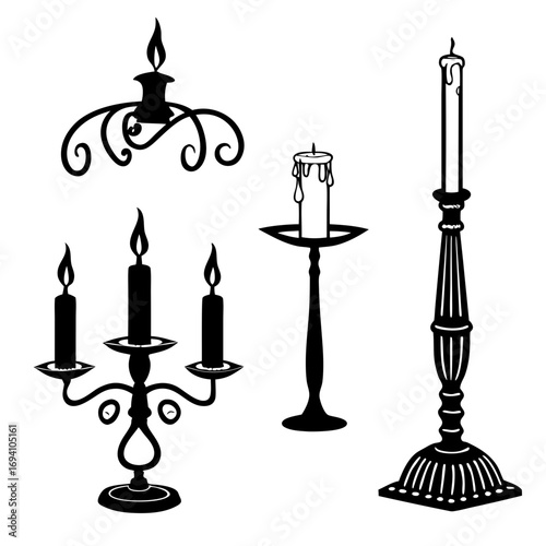 Ornate candle holders with burning flames candlestick