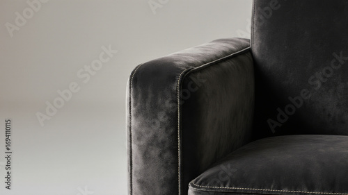 Soft velvet armrest in charcoal tone with modern curved design