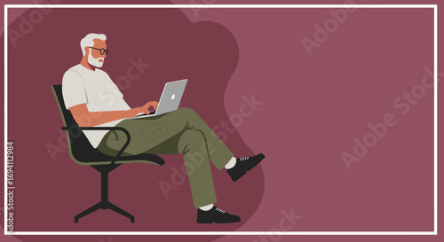 A modern senior man with glasses and a beard sits comfortably, engaged in work or leisure on his laptop. Ideal for remote work, lifelong learning, and digital elder lifestyle.