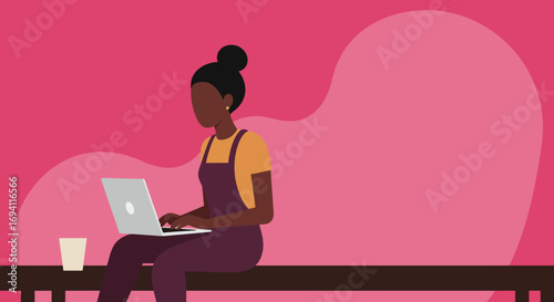 African American woman focused on remote work on her laptop, illustrating productivity and modern business lifestyle. Ideal for technology, education, or freelance concepts.