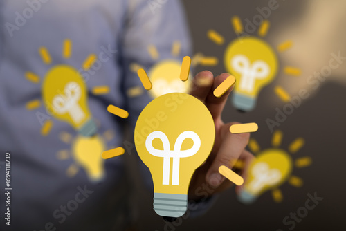 Person chooses a lightbulb,...