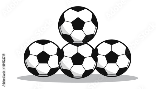 Four soccer balls stacked in triangular shape