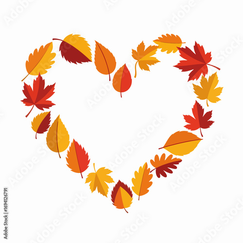 A Heart Shape Formed By Autumn Leaves In Warm Colors