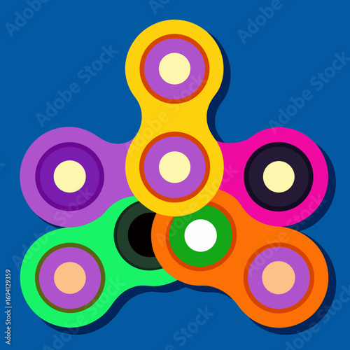Colorful spinner toy on a blue background