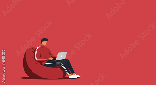 Man in casual attire comfortably working on a laptop while relaxing on a bean bag, representing modern remote work, freelancing, and casual productivity.