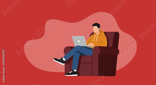 Man comfortably works or studies remotely on his laptop from an armchair, illustrating modern freelancing, distance learning, or relaxed digital leisure.