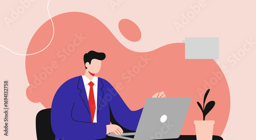 Professional businessman in a suit working diligently on his laptop at a modern workspace. Ideal for concepts of productivity, remote work, or corporate business.