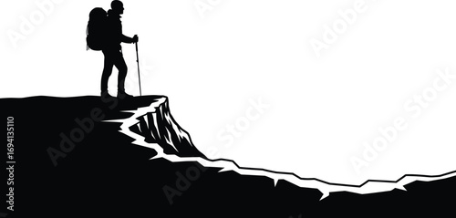 Silhouette of a hiker standing a cliff edge, person is wearing a backpack and using trekking poles