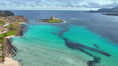 idyllic la Pelosa beach in Sardinia, Italy, idyllic Mediterranean coast drone shot, turquoise lagoon in east Sardinia, vacation in Italy