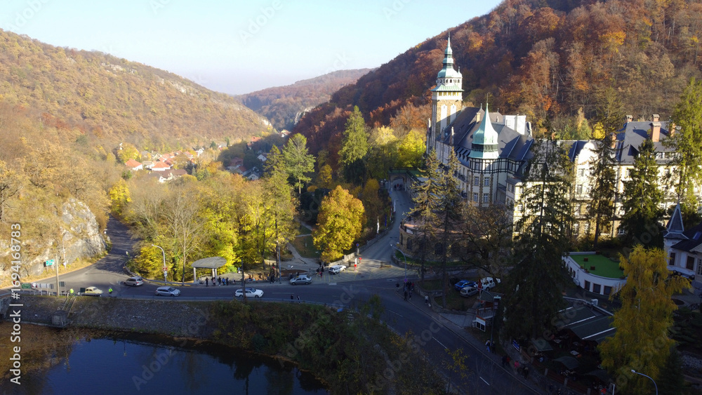 Fototapeta premium Aerial view of Lillafüred Palace Hotel in the Bükk Mountains, Hungary. Surrounded by colorful autumn forest, hills, and scenic landscape. A popular travel and tourism destination in Europe.