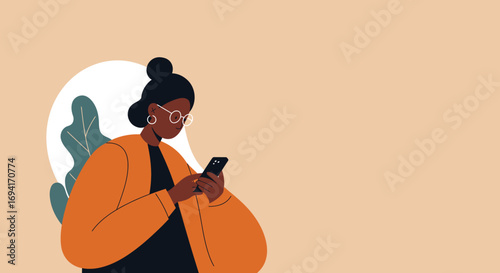 Stylish African American woman with glasses engaging with her smartphone on a minimalist background. Perfect for themes of technology, communication, and digital lifestyle.