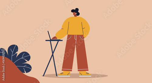 A focused person stands and works on a laptop, embodying productivity, remote work, and modern digital lifestyle. Ideal for business, education, or technology concepts.