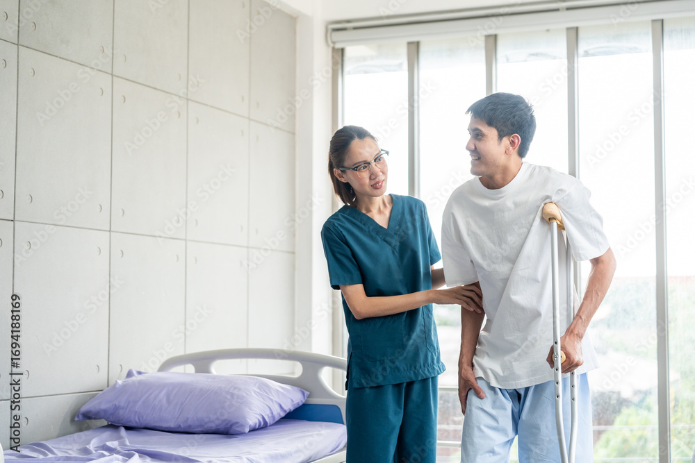 Obraz premium Physical therapy. Female Nurse aids young man in recovering from spine injury and providing orthopedic massage Orthopedic healthcare and chiropractor with person for physical therapy rehabilitation