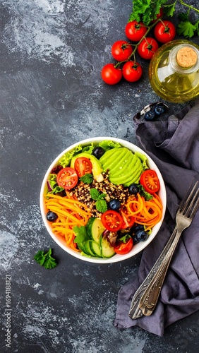 Colorful healthy bowl with quinoa and vegetables