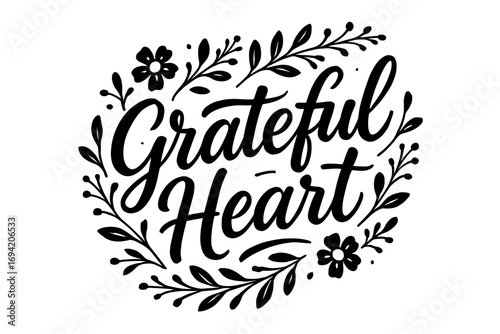 Grateful Heart modern hand lettering smooth curves balanced composition clear readable letters consistent style surrounded by delicate floral ornaments and botanical elements diagonal.