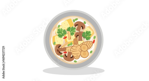 Exotic mushroom and tofu soup bowl with ginger and parsley garnish