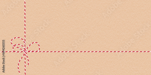 Blank gift wrap template for holidays. Handmade Christmas present Background. Card poster banner invitation template with striped twine bow. Natural paper gift tag