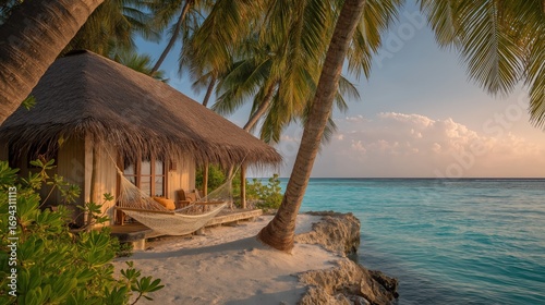 Fototapeta Naklejka Na Ścianę i Meble -  a charming tropical beach bungalow with a thatched roof and hammock, located steps from turquoise water, surrounded by lush palm trees and white sand, golden hour 