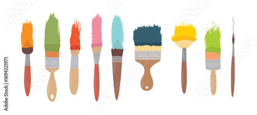 Coloured brush strokes with brushes, art materials