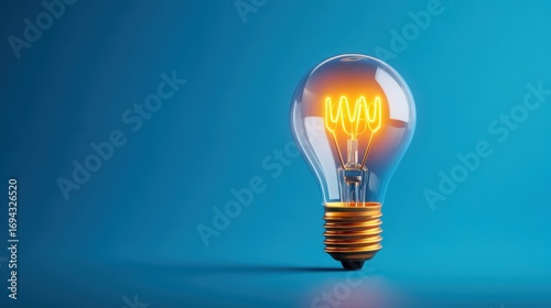 Bright Light Bulb with Glowing Filament on Minimalist Background