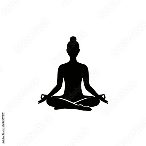 Silhouette of a person in a meditative pose, symbolizing inner peace and mindfulness practices