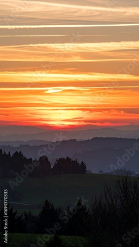 Colorful sunset over hills