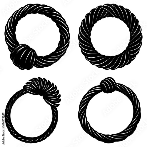 Four black and white rope rings with varying knot designs arranged on a white background surface view