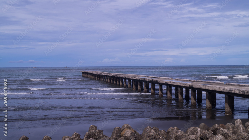 Fototapeta premium A photograph of an old Kalibo Jetty Port at New Buswang Beach. Taken from Kalibo, Aklan, Phillipines. 