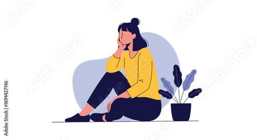 Woman sitting alone contemplating her thoughts near a potted plant