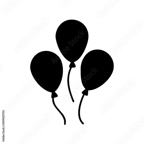 A festive trio of balloons floats gently in the air silhouette