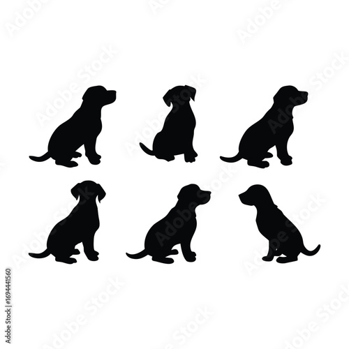 Six Black Dog Silhouettes Sitting on White Background