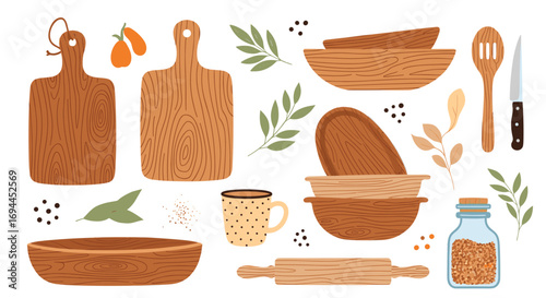 Rustic kitchen utensils and woodenware collection with botanical accents for baking and food preparation