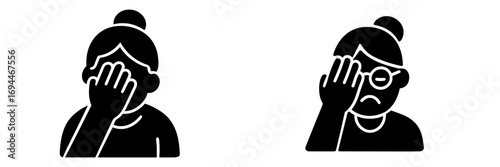 Senior woman making a facepalm gesture, expressing disappointment, regret, or frustration with a hand on her face