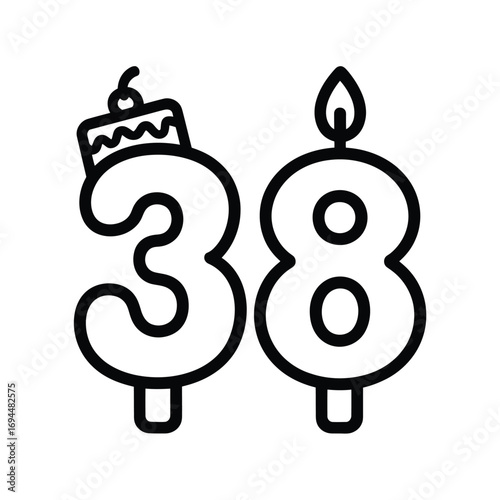 Number 38 birthday candle with cake topper and flame